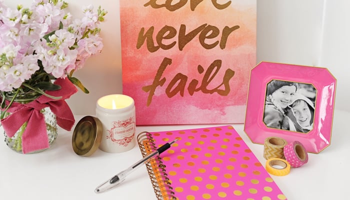 Blog header pink and gold desk